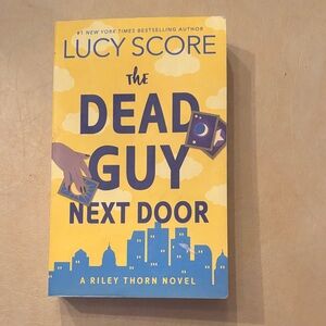 The Dead Guy Next Door by Lucy Score,  Book